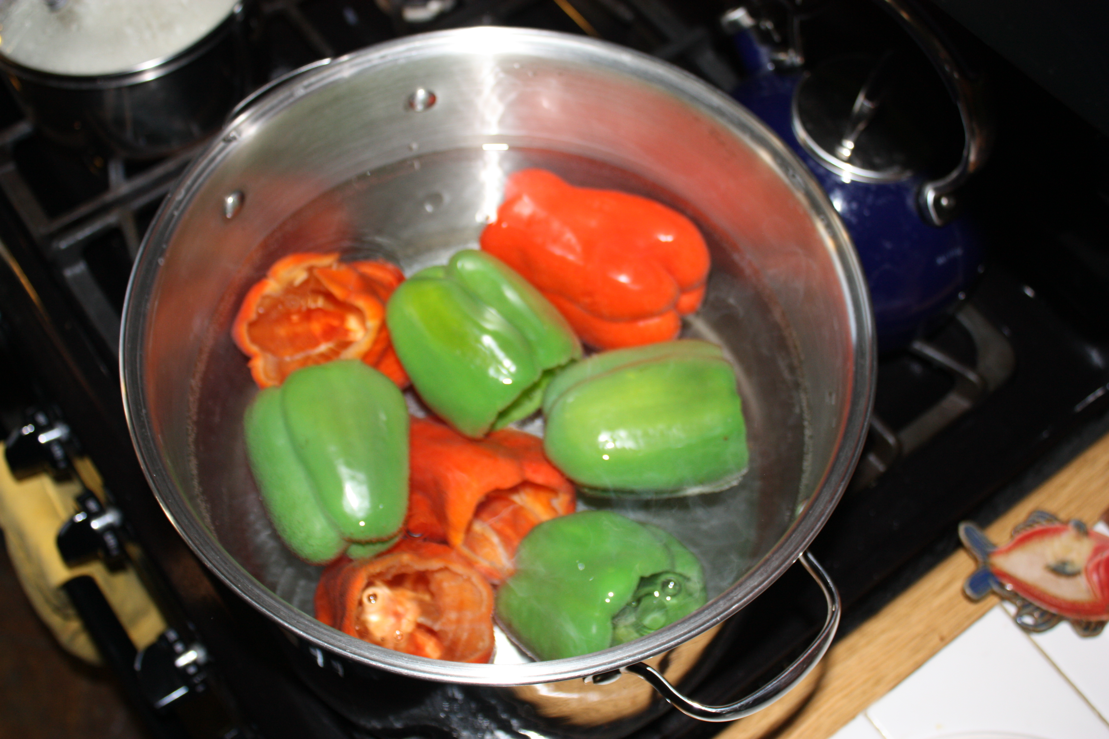 Blanch peppers in boiling water for five minutes (blanching just means ...